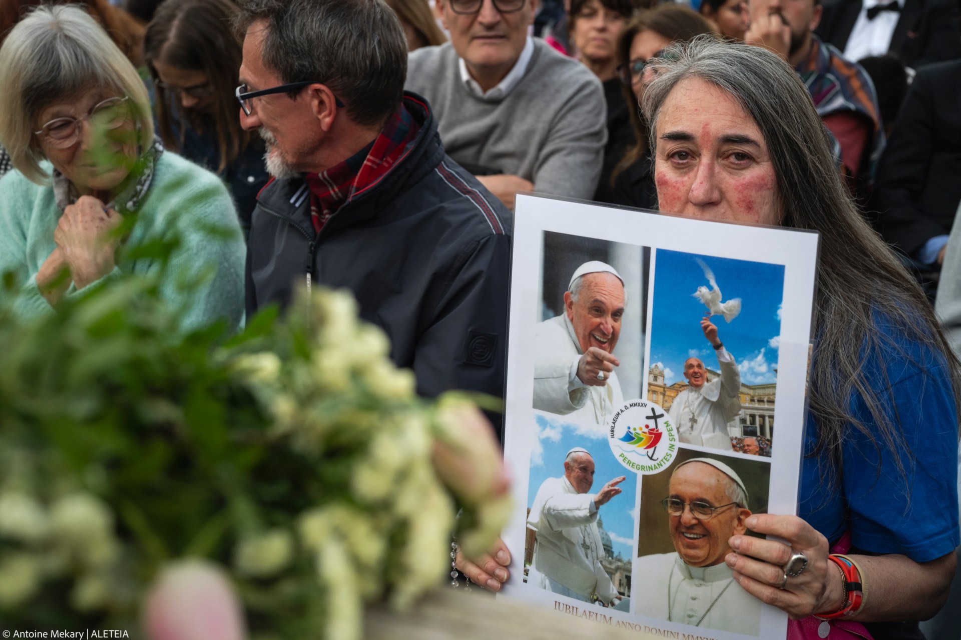 Devotees attend a Rosary in homage to Pope Francis following his death in Saint Peter's Square, the Vatican, on April 21, 2025