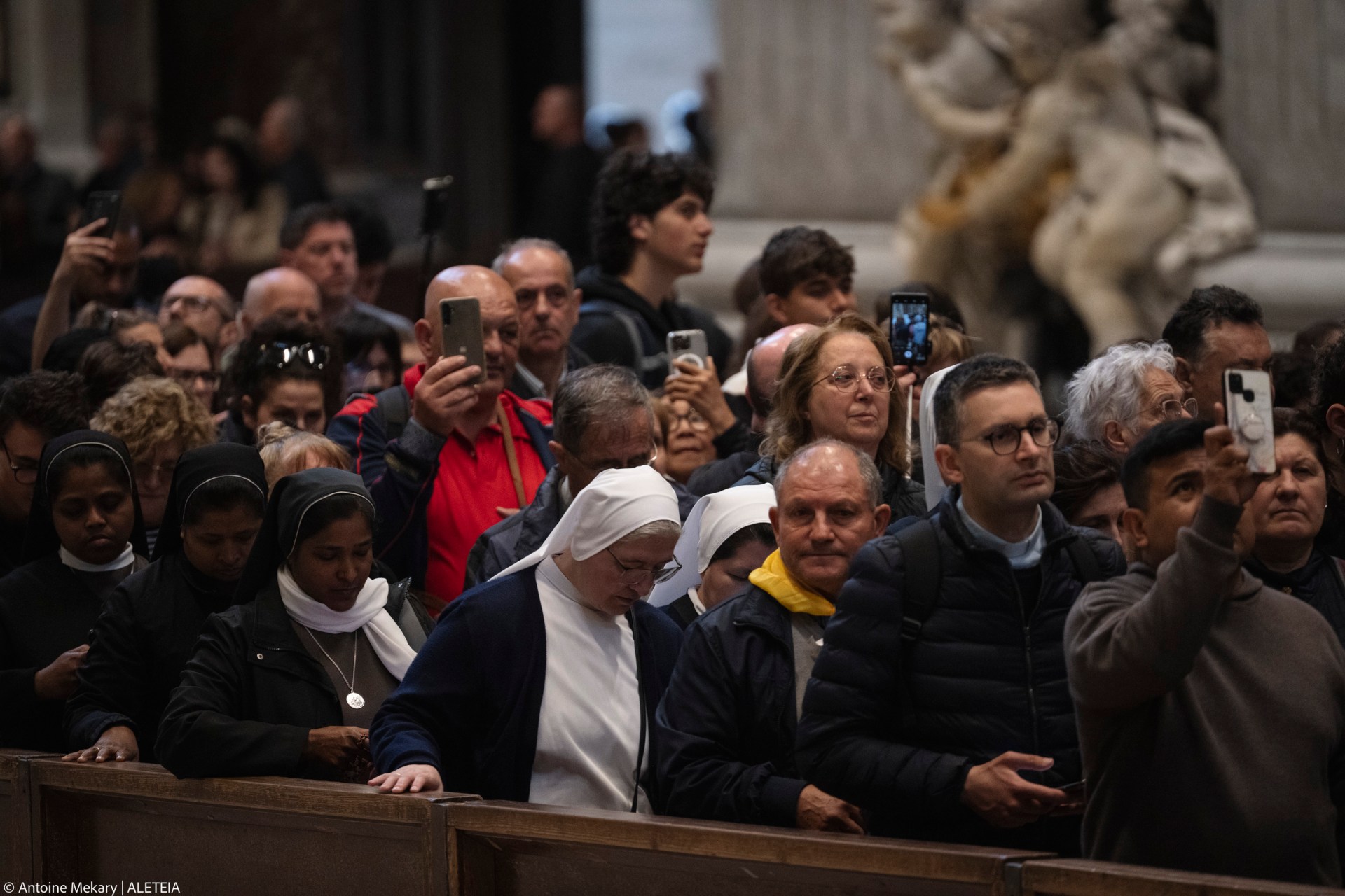 People queue at St Peter's Basilica to pay their respects to late Pope Francis as he lies in state in The Vatican, on April 24, 2025.