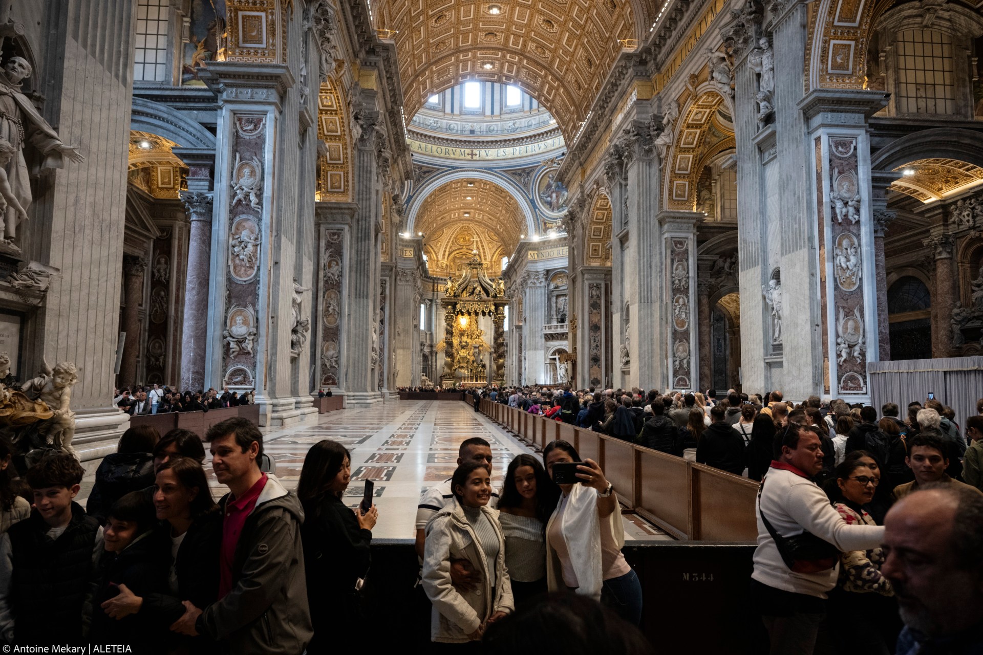 People queue at St Peter's Basilica to pay their respects to late Pope Francis as he lies in state in The Vatican, on April 24, 2025.