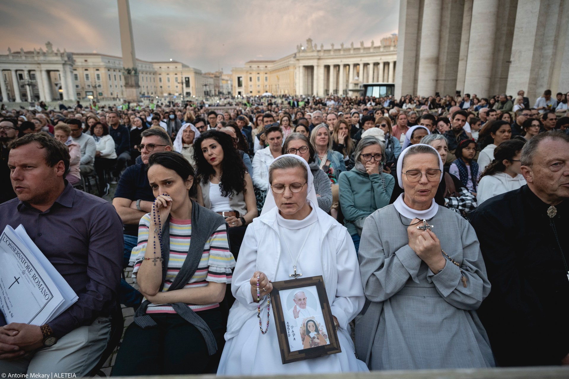 Faithful pray during the Rosary prayers in honor of Pope Francis