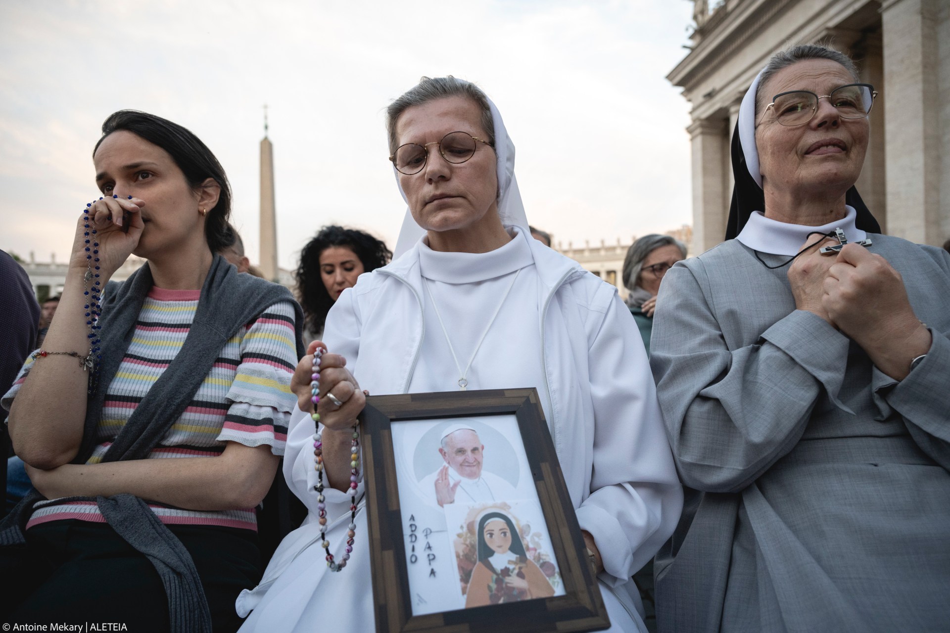 Faithful pray during the Rosary prayers in honor of Pope Francis