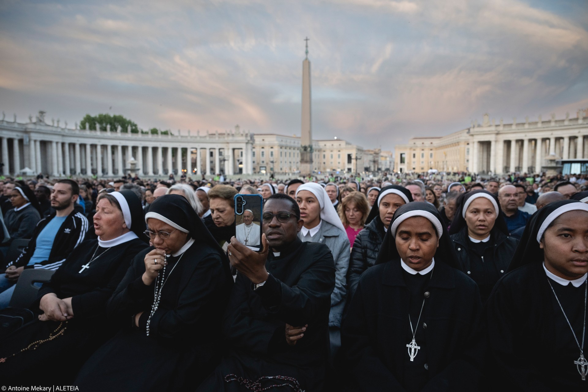 Faithful pray during the Rosary prayers in honor of Pope Francis