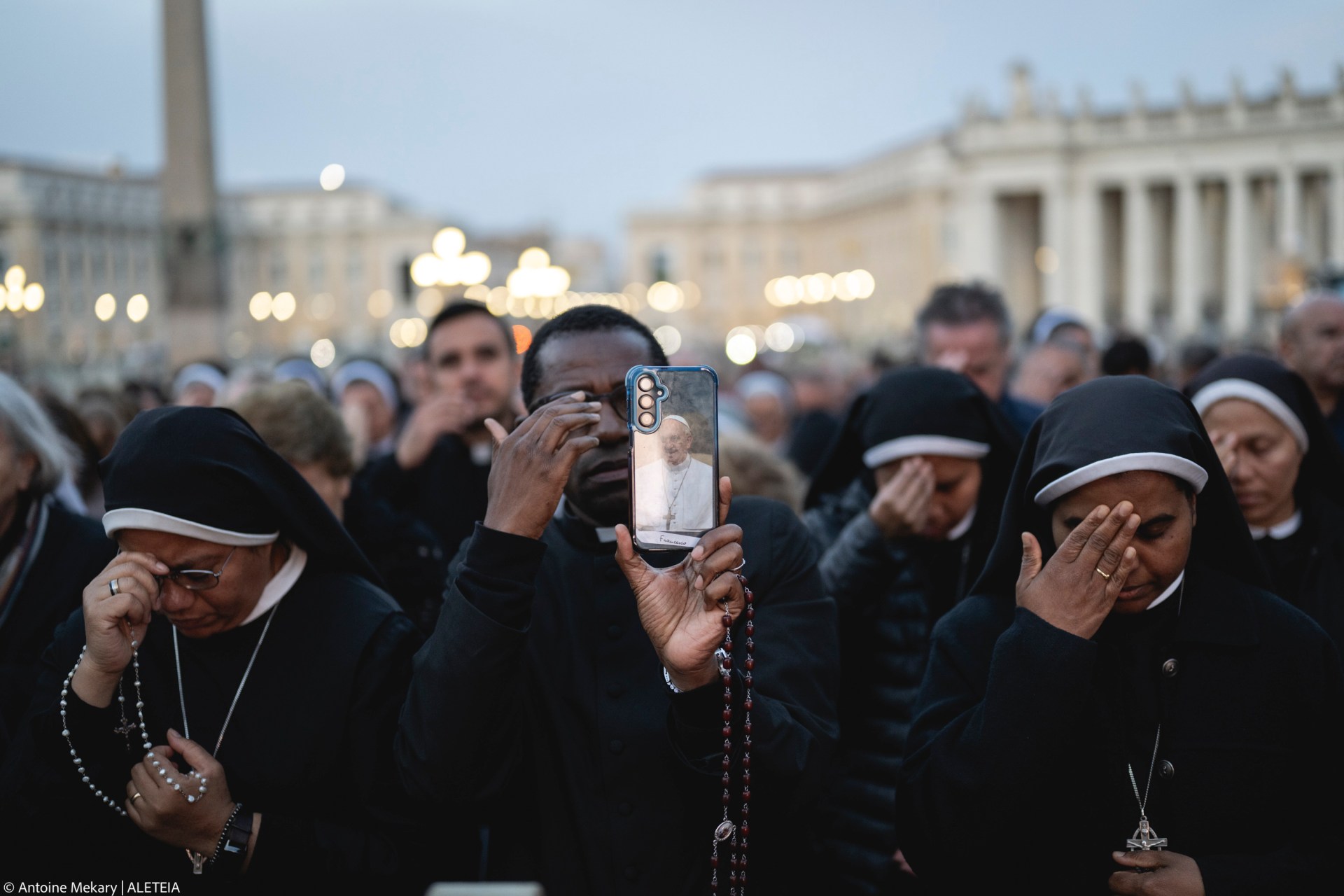 Faithful pray during the Rosary prayers in honor of Pope Francis
