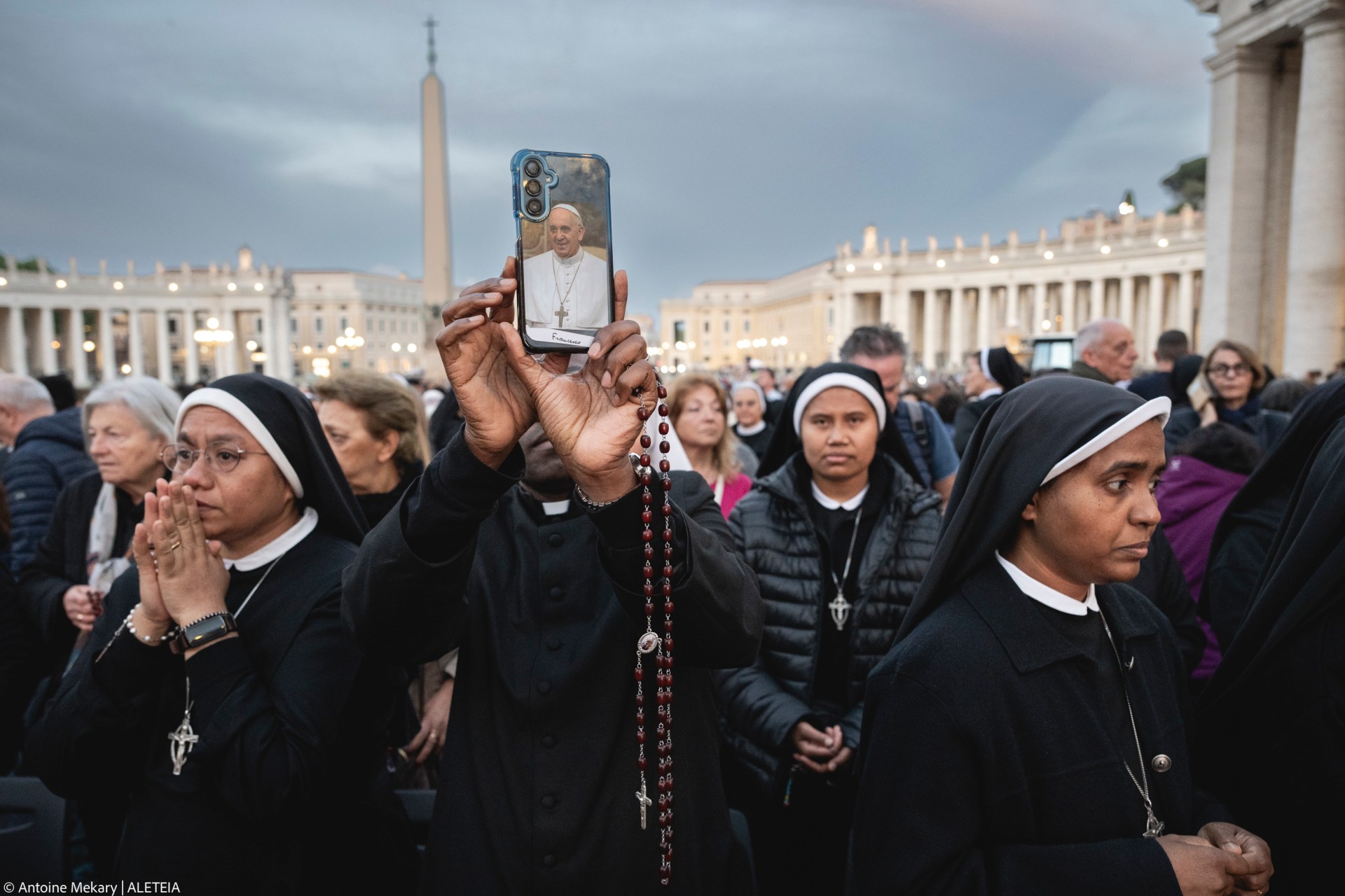 Faithful pray during the Rosary prayers in honor of Pope Francis