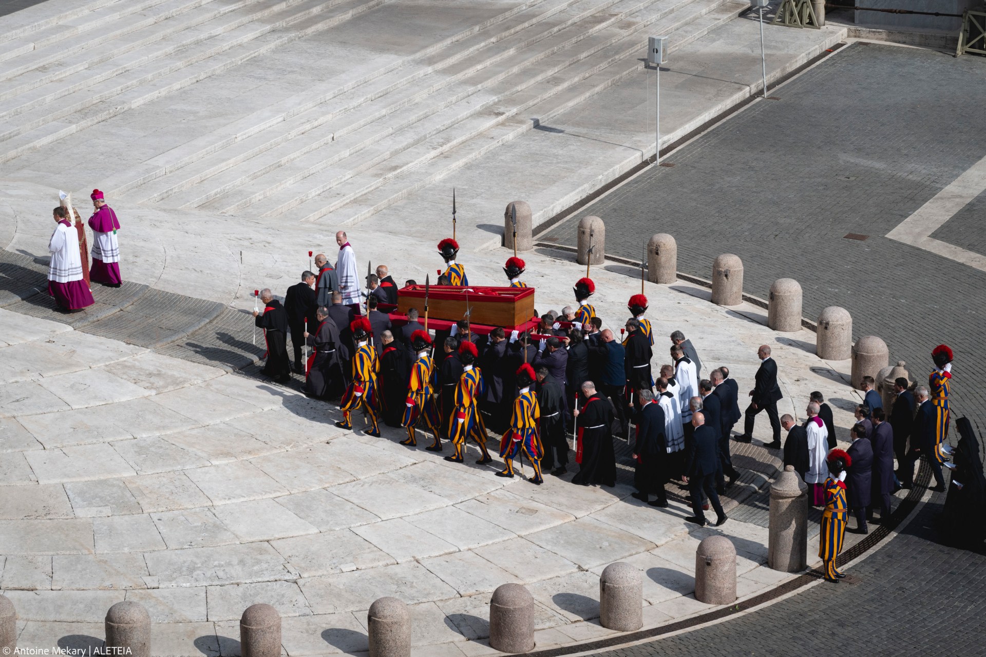 Pallbearers carry the coffin of the late Pope from the chapel of Santa Marta to St. Peter's Basilica in the Vatican on April 23, 2025.