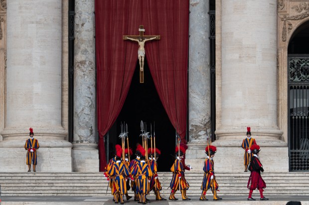 The ceremony with the Pope Francis' body, who will lie in state at St. Peter's Basilica for three days, pass through the crowd at the Vatican, Wednesday, April 23, 2025.