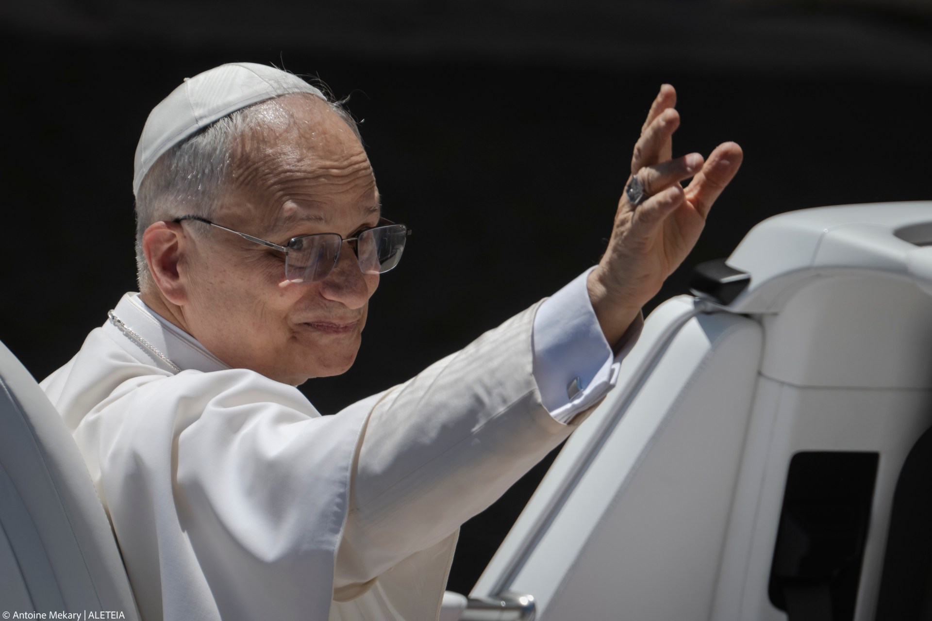 Pope Leo XIV waves to the crowd as he leaves on a popemobile after the weekly general audience at St Peter's Square at The Vatican, on May 28, 2025
