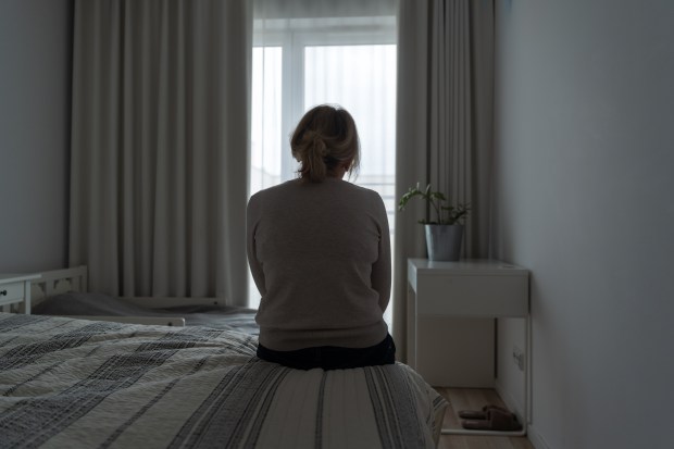 WOMAN-ALONE-BACK-shutterstock