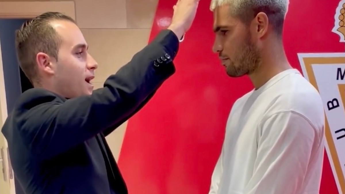 priest blesses tennis Alcaraz