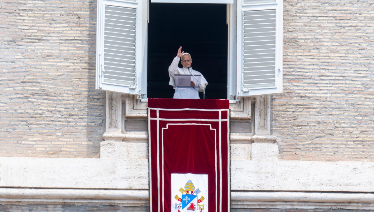 Pope Leo XIV waves to the crowd from the window of the apostolic palace overlooking St. Peter's square during an Angelus prayer on the Solemnity of Saints Peter and Paul, Rome's patron saints in The Vatican on June 29, 2026.