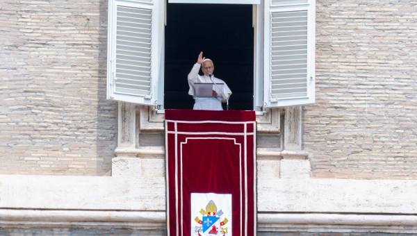 Pope Leo XIV waves to the crowd from the window of the apostolic palace overlooking St. Peter's square during an Angelus prayer on the Solemnity of Saints Peter and Paul, Rome's patron saints in The Vatican on June 29, 2026.
